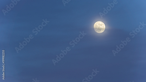 Germany, Bright moonshine with slightly cloudy sky in the night
