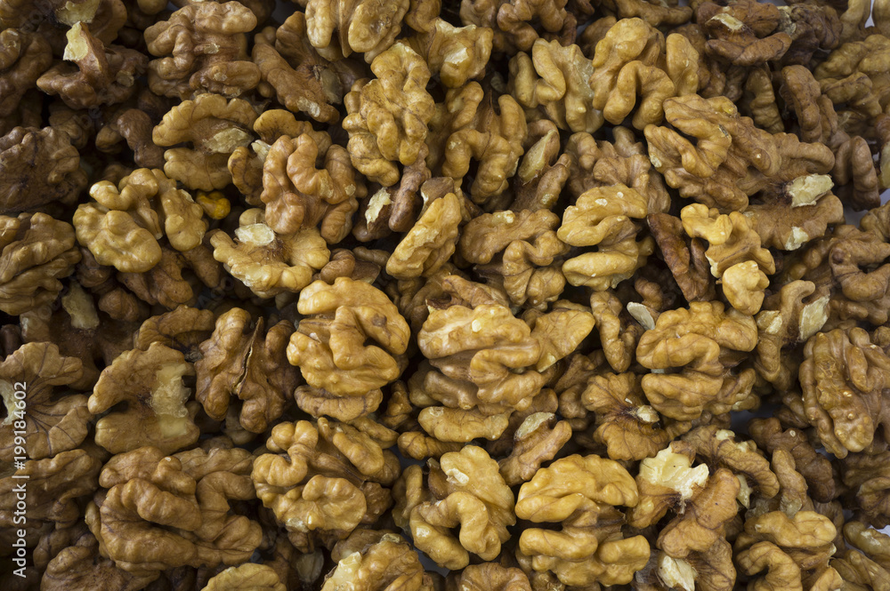 Walnuts background. Kernels walnuts. Top view. Vegetarian or healthy eating. Walnuts background. Kernels walnuts. Top view. Vegetarian or healthy eating.