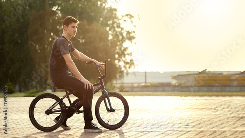 teenager on a bicycle