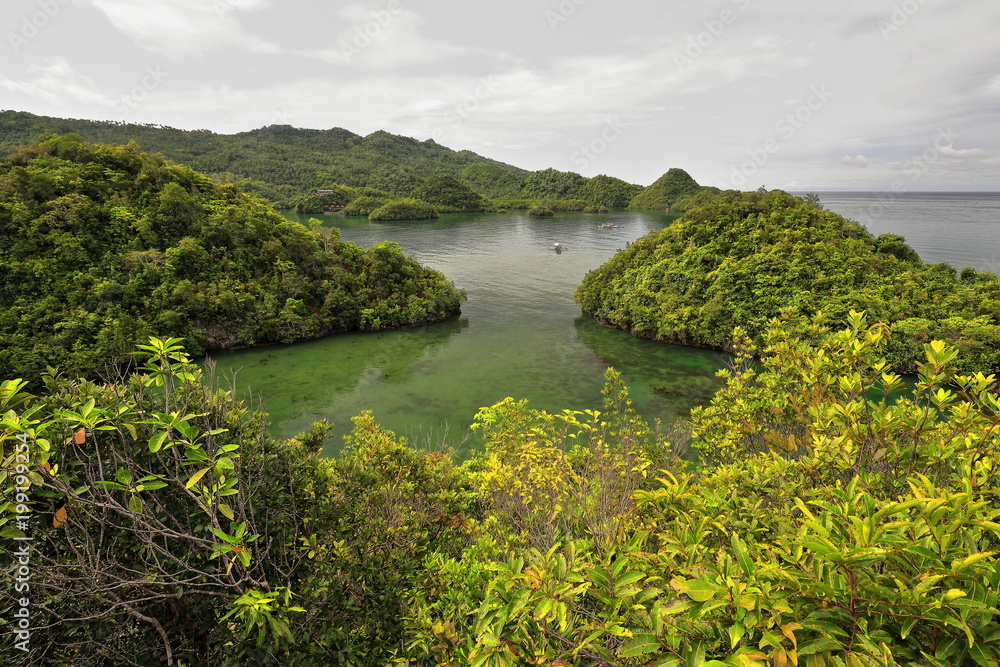 Bangkas and balangays anchored-bay to the S.of Latasan island. Sipalay-Philippines. 0367