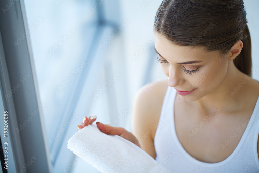 Face Washing. Happy Woman Drying Skin With Towel