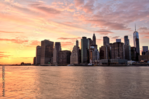 New York City Lower Manhattan with Brooklyn Bridge at Sunset © romanslavik.com