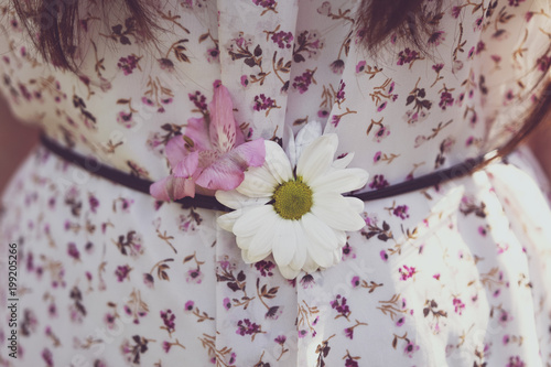 Blooms in the dress with floral pattern