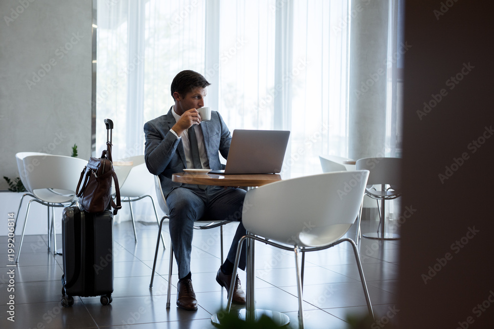 Business executive waiting at airport lounge Business executive waiting at airport lounge