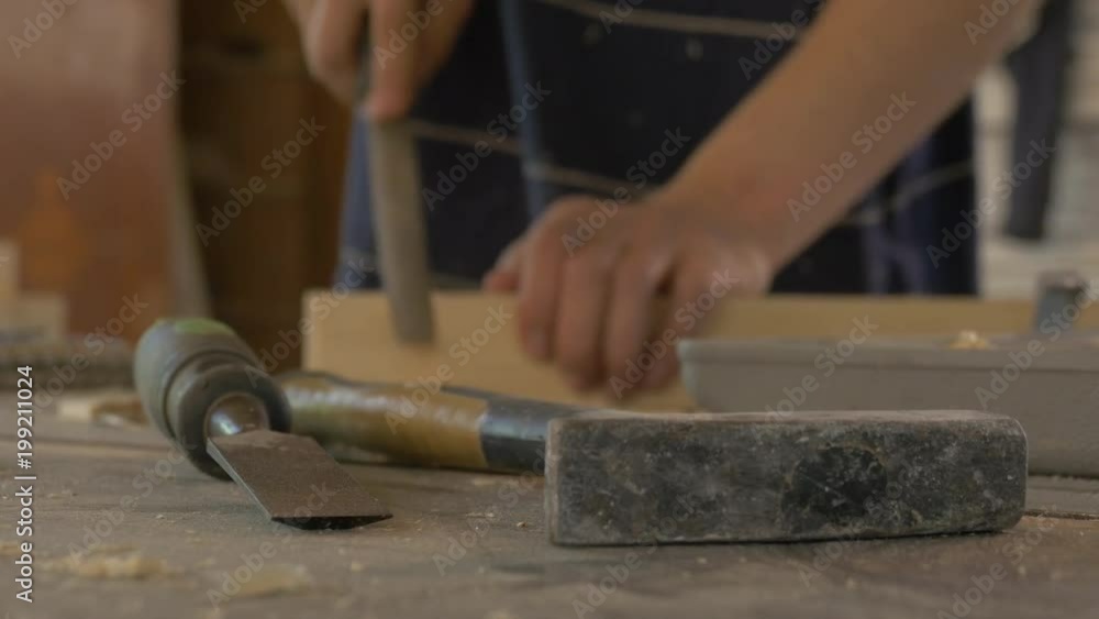 Tools near a man working