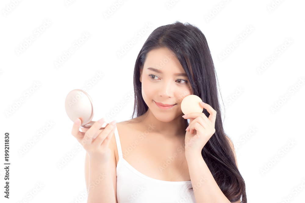Portrait of beautiful asian woman applying powder puff at cheek makeup of cosmetic, beauty of girl with face smile isolated on white background, wellness and healthcare concept. Portrait of beautiful asian woman applying powder puff at cheek makeup of cosmetic, beauty of girl with face smile isolated on white background, wellness and healthcare concept.