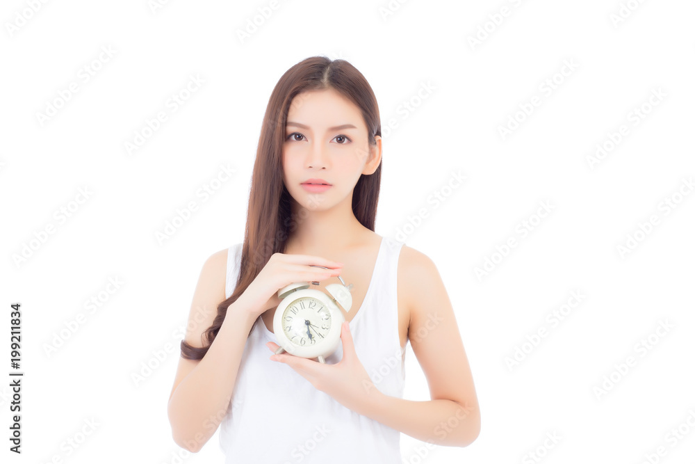 Beautiful asian young woman holding alarm clock, Portrait of woman with wake up, girl with isolated on white background, time with deadline concept. Beautiful asian young woman holding alarm clock, Portrait of woman with wake up, girl with isolated on white background, time with deadline concept.