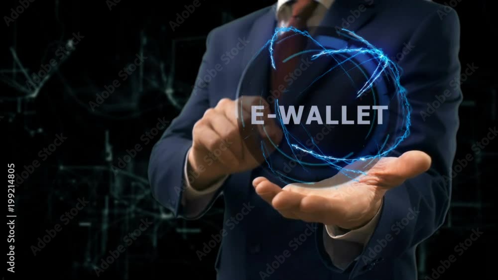 Businessman shows concept hologram E-wallet on his hand. Man in business suit with future technology screen and modern cosmic background Businessman shows concept hologram E-wallet on his hand. Man in business suit with future technology screen and modern cosmic background
