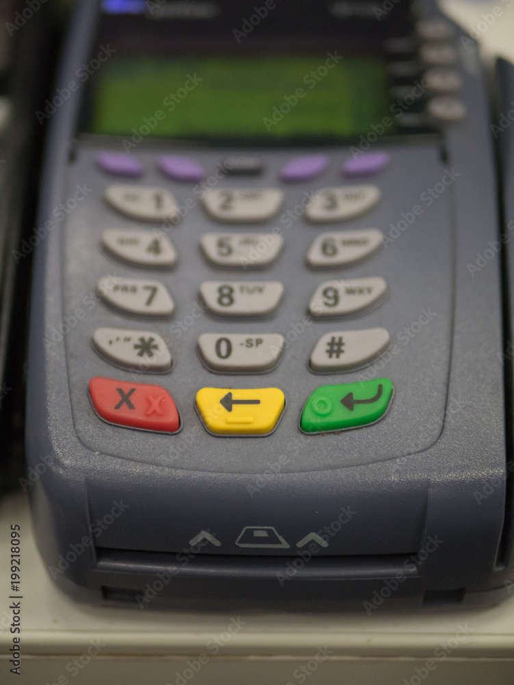 close up shot of a credit card terminal in a store close up shot of a credit card terminal in a store