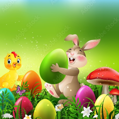 Cartoon rabbit with easter eggs and baby chicken in the field