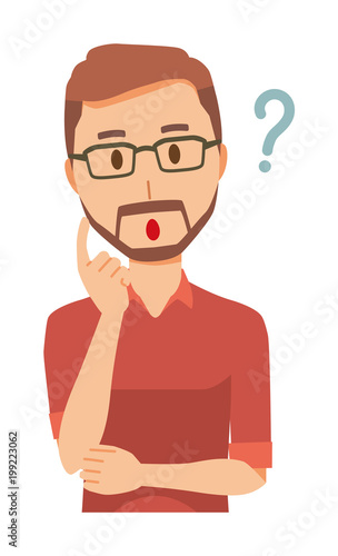 A bearded man wearing eyeglasses is thinking