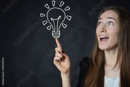 A businessman shows an inscription: