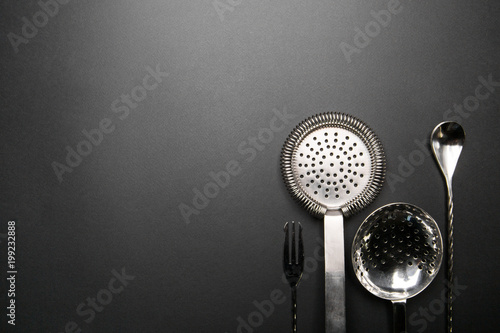 Bartender equipment for making cocktail. Strainer, spoon. Food and beverages concept. Food and beverages concept