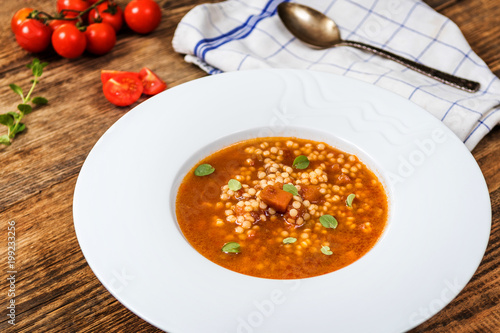 Tomato soup with egg barley photo