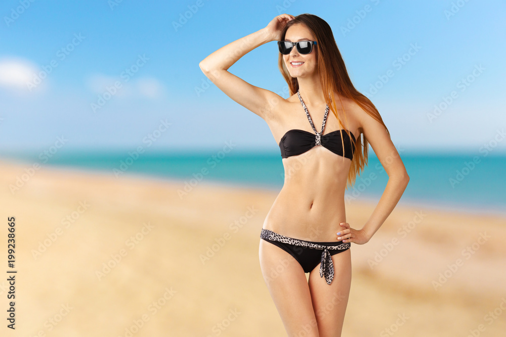Young attractive woman in swimsuit