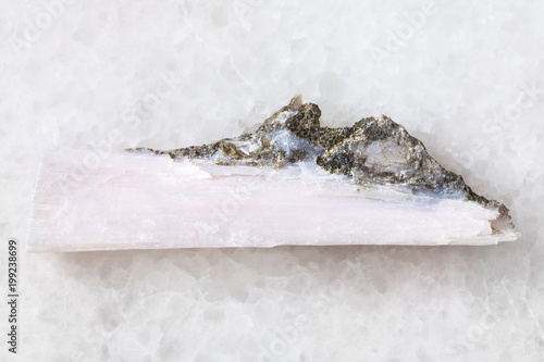 raw crystal of xonotlite gemstone on white