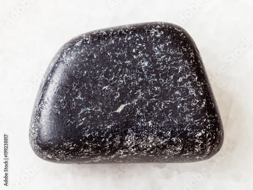 tumbled Chromite stone on white