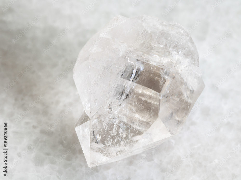 rough rock crystal of quartz gemstone on white rough rock crystal of quartz gemstone on white