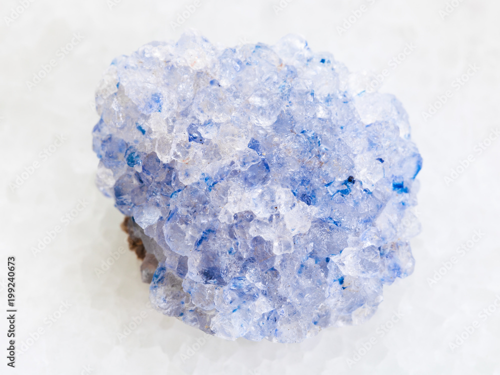 Fototapeta premium raw celestine stone on white marble