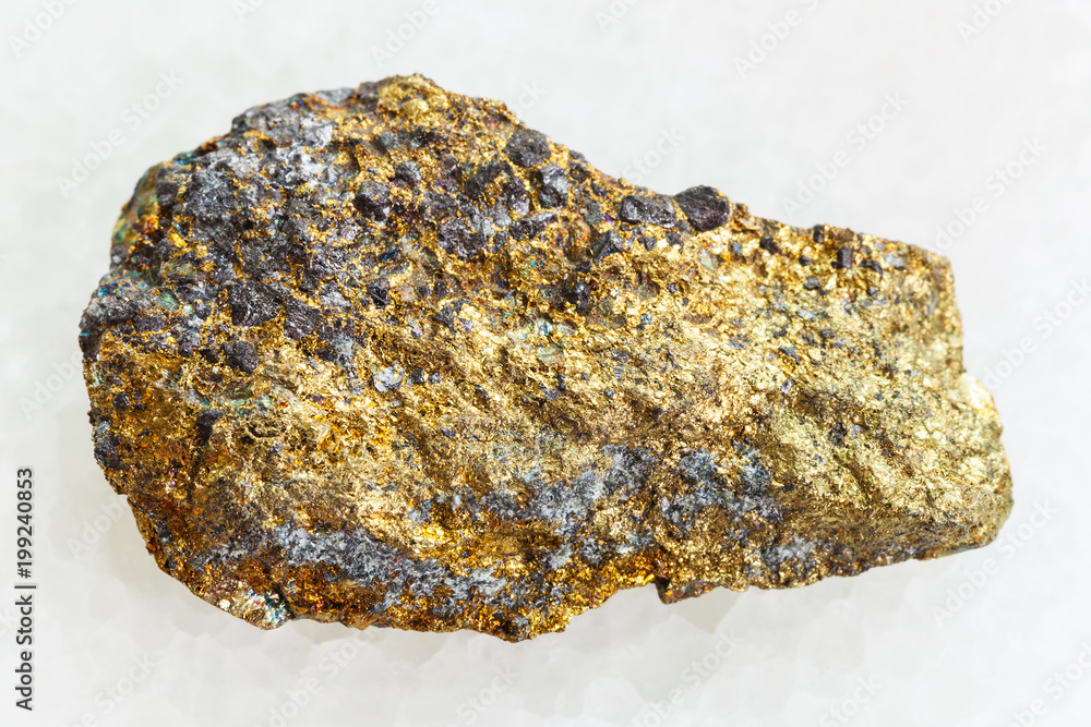 rough pyrite ore on white marble rough pyrite ore on white marble