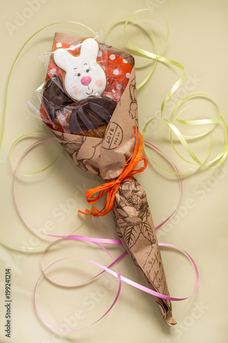 gingerbread Easter bunnies, cookies, oranges, chocolate, candy, packaged in a beautiful gift packaging