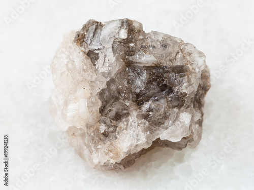 Vászonkép raw Halite (rock salt) stone on white marble