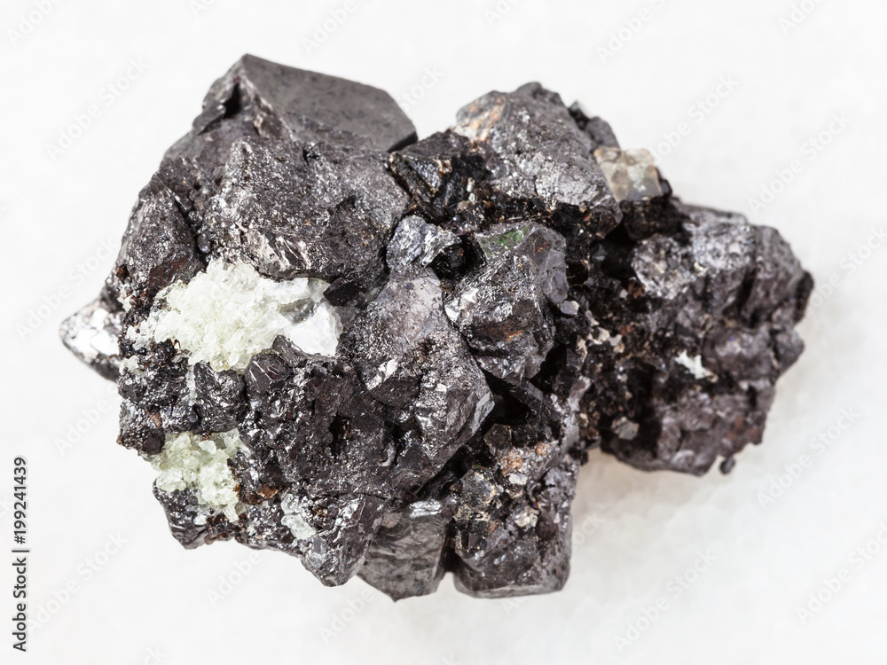 raw crystalline Magnetite stone on white