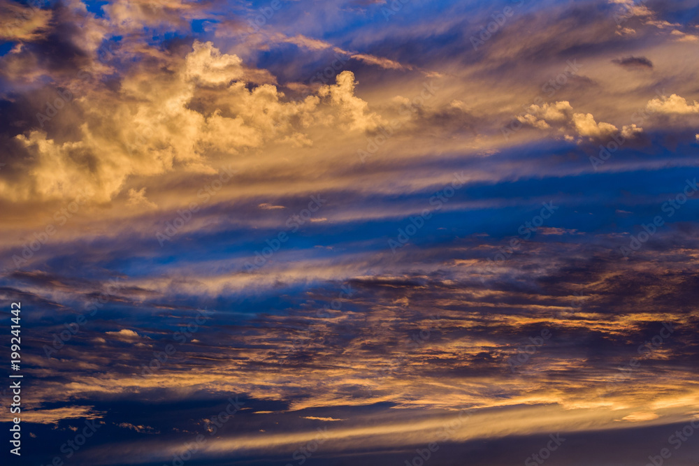 Romantic and dramatic cloudscape in sunset / sunrise time.