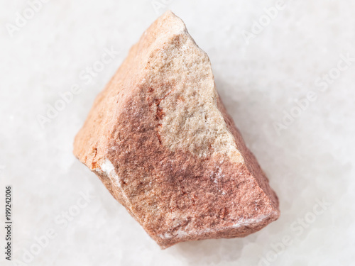 Fotografie calcareous sandstone stone on white