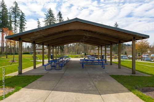 Picnic Tables under Shelter in Suburban City Park