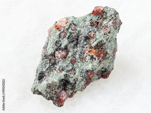 raw eclogite stone on white photo