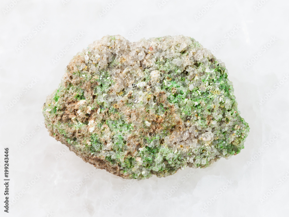 green Pintadoite crystals in rough stone on white green Pintadoite crystals in rough stone on white