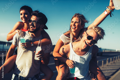 Group of young happy friends having fun time