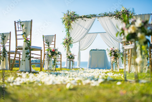 Romantic wedding ceremony on the lawn Sea view.