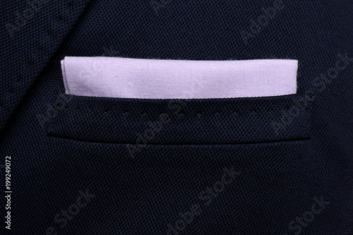 pocket square Purple - handkerchief in the breast pocket of a man's wool luxury dark blue suit © oleh91