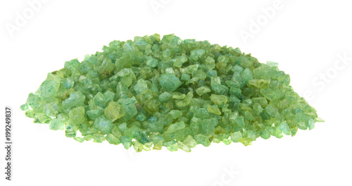 green sea salt isolated on white background