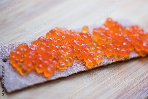 sandwich of bread and red caviar