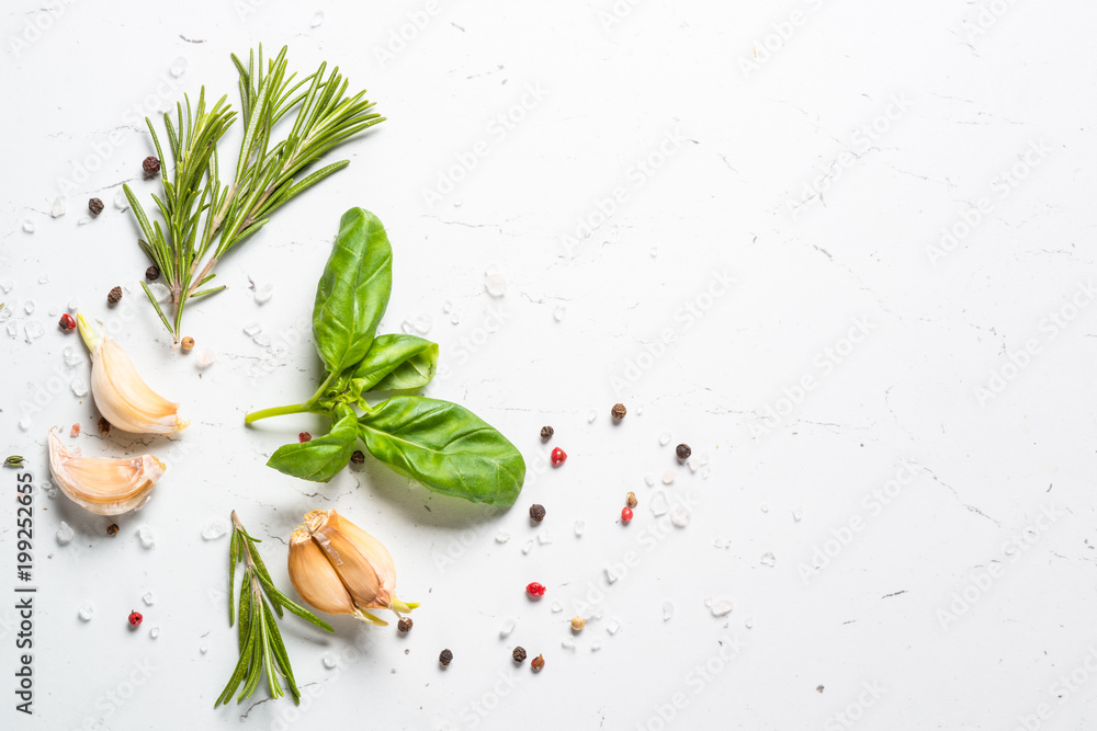 Spices and herbs over white stone table top view.  - obrazy, fototapety, plakaty 