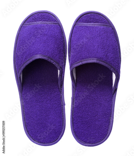 Violet hotel slippers isolated on white background. Close up, high resolution