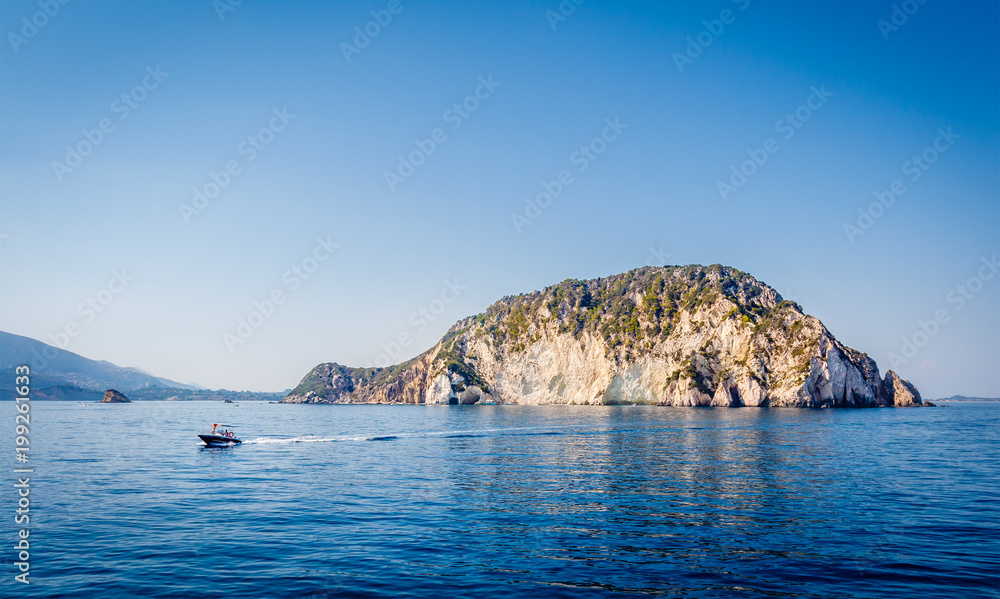 Motorboat driving on Ionian sea close to Marathonisi Island Zakynthos, Greece