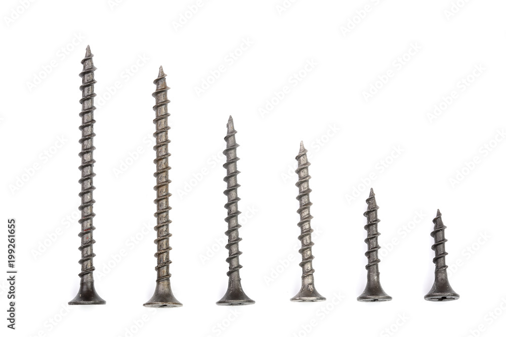 black screws isolated on white background closeup. Top view. black screws isolated on white background closeup. Top view.