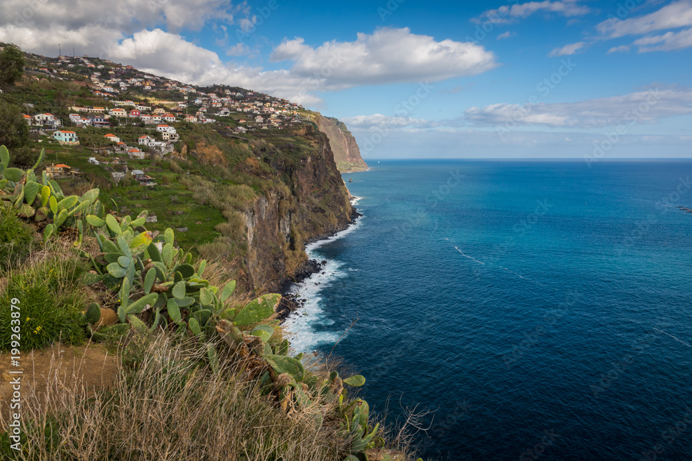 Cliff over the Atlantic ocean in Ribeira Brava on the Madeira island, Portugal