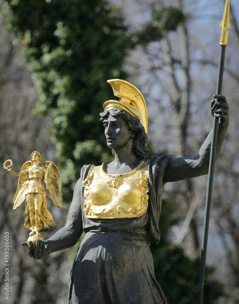 Golden plated statue of Athena/Minerva holding Nike Stock Photo | Adobe  Stock