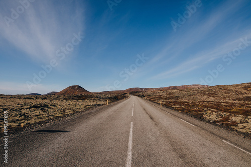 empty asphalt road in majestic icelandic landscape at sunny day  reykjanes  iceland