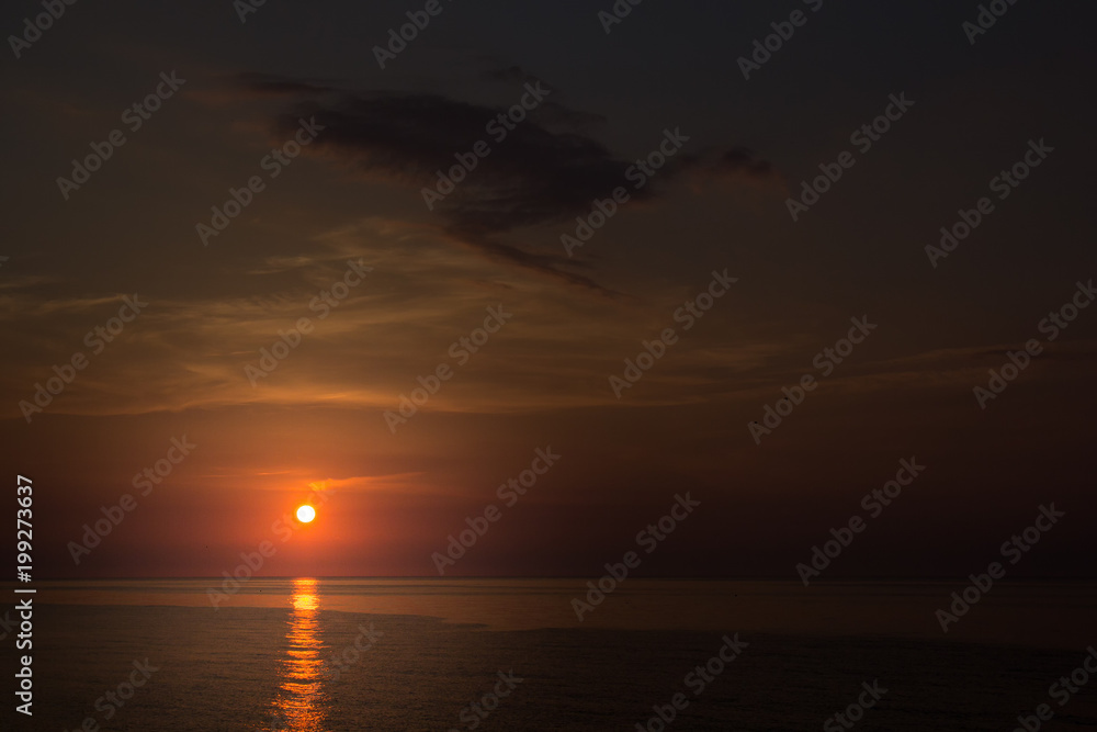 Morning sky with the sun over the sea at sunrise, Black Sea, Romania