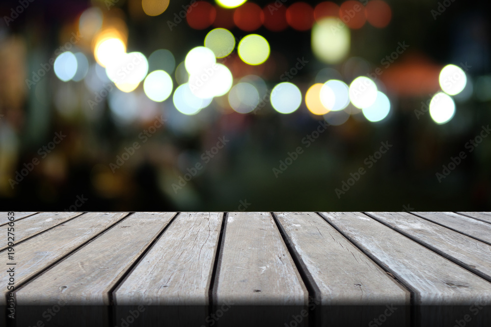 Empty wooden table in fornt blurred background, mock up for presentation product template