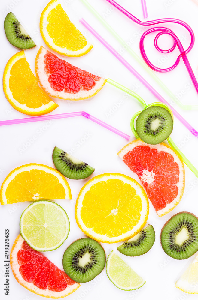 Fototapeta premium Citrus and colorful straws for coctail
