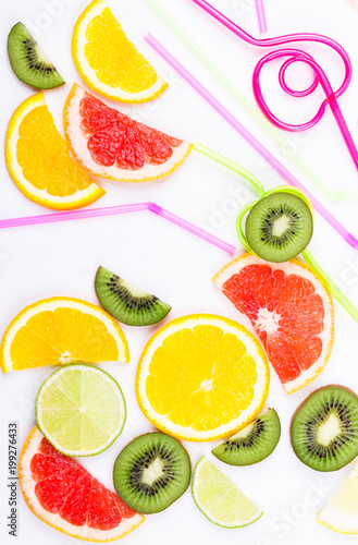 Citrus and colorful straws for coctail