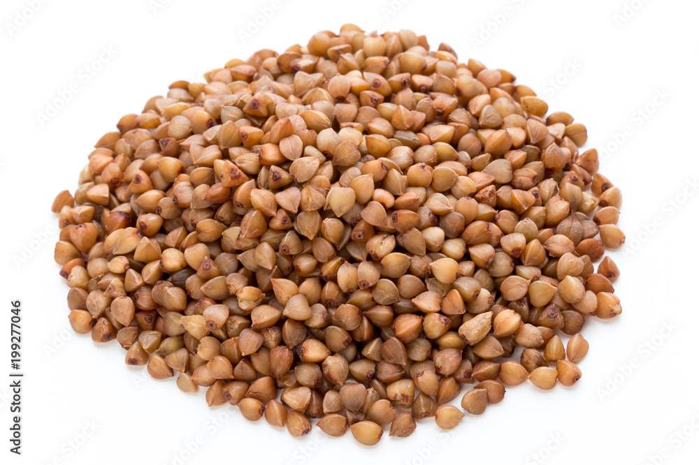 Buckwheat grains isolated on the white background. Buckwheat grains isolated on the white background.