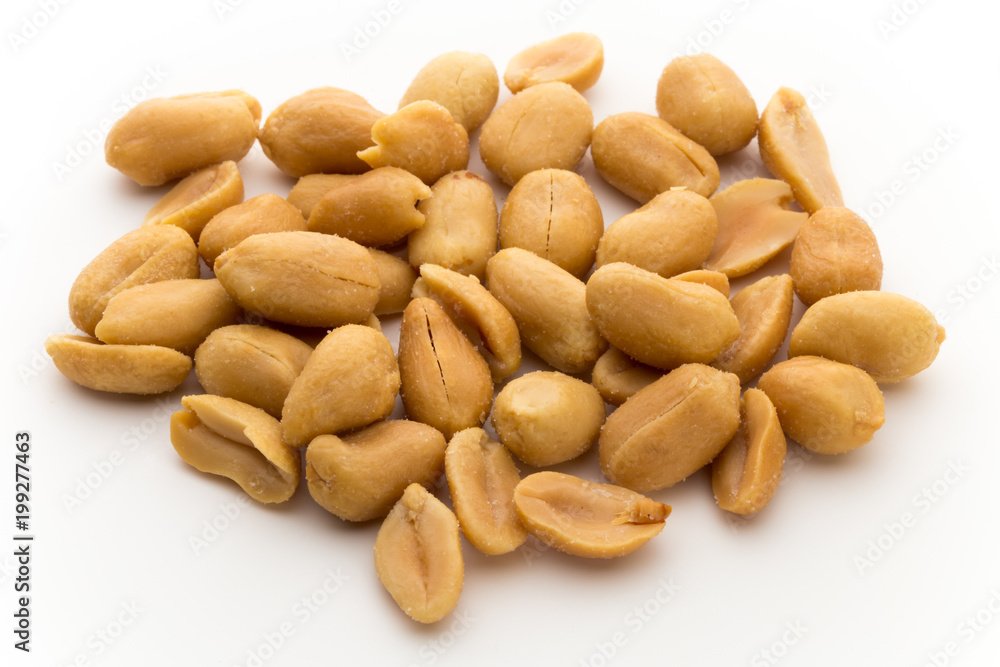 Peeled peanuts on the isolated background. Peeled peanuts on the isolated background.